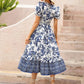 All-over positioning print printed puff-sleeved maxi-neck dress