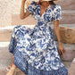 All-over positioning print printed puff-sleeved maxi-neck dress